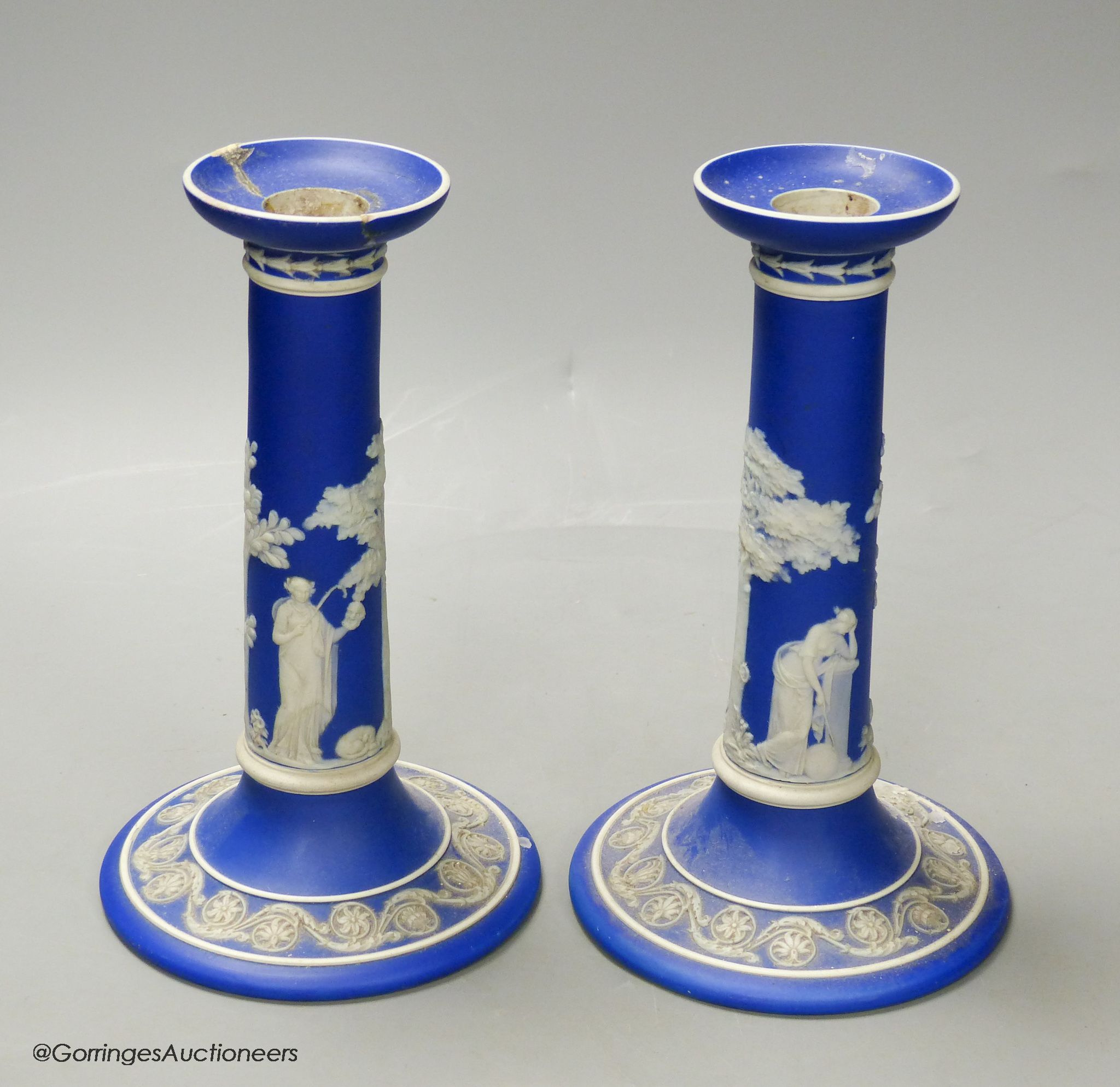 A pair of 19th century Wedgwood blue jasper candlesticks, height 20cm (a.f.)